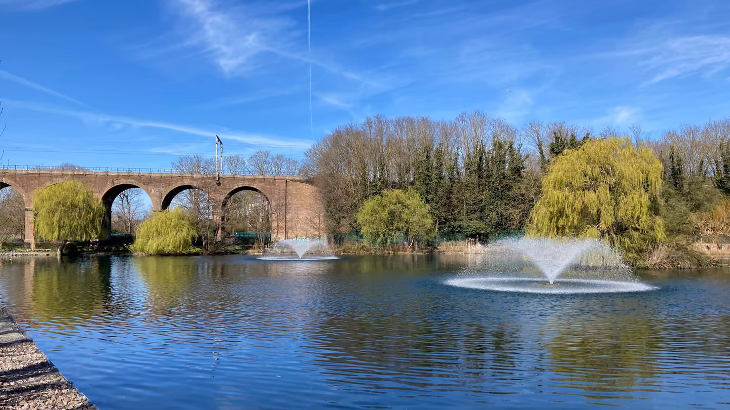 The lake and railway viaduct in Central Park, Chelmsford