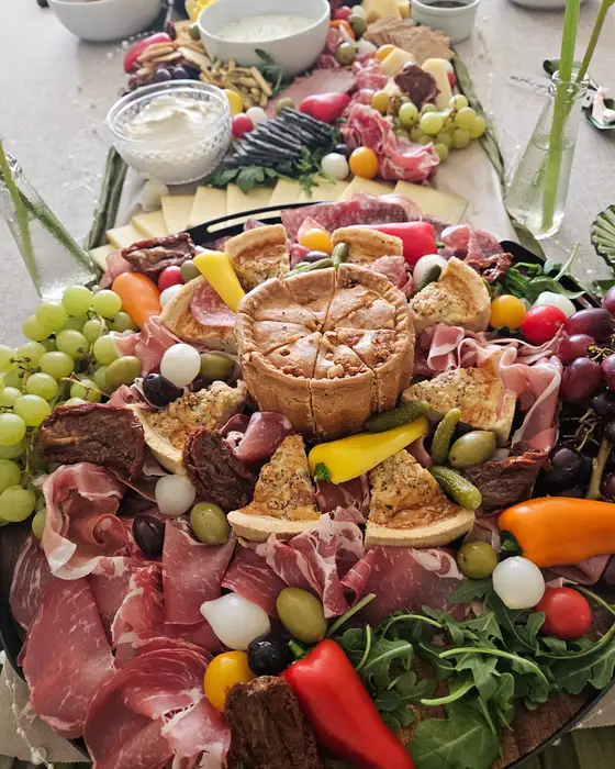 Charcuterie around a raised pie
